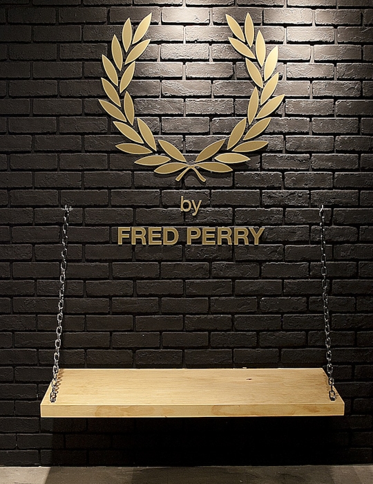 The Fred Perry Laurel Wreath Store in Singapore, designed by Studio Königshausen, pays homage to music and youth culture through its unique design. 